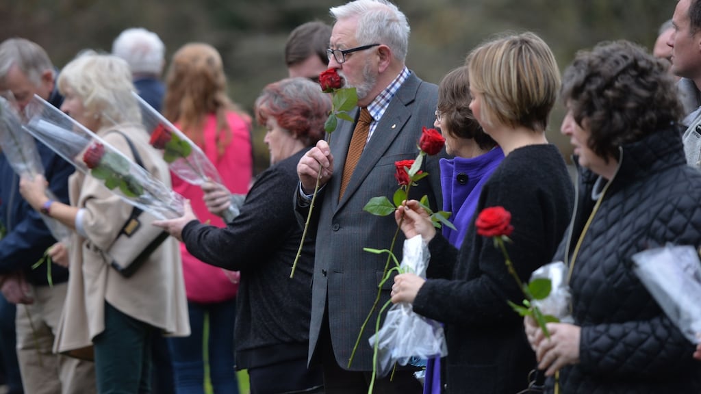 Seamus O’Brien, father of Cathal O’Brien, who disappeared in Cork in 1994, with a rose during the annual missing persons ceremony at Farmleigh in 2016. File photograph: Alan Betson/The Irish Times