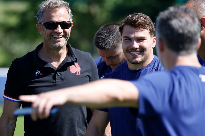 French coach Fabien Galthie and scrum-half Antoine Dupont in training at their base camp's training pitch in Rueil-Malmaison, outside Paris, on Monday. Photograph: Ludovic Marin/POOL/AFP via Getty Images