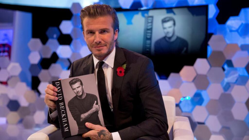 David Beckham at a recent book launch. His son Brooklyn has attracted interest from his former club Manchester United.