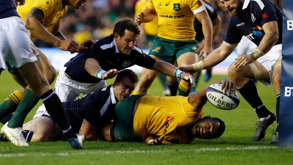 Tevita Kuridrani reaches to score Australia’s winning try against Scotland at Murrayfield. Photograph: Reuters/Russell Cheyne