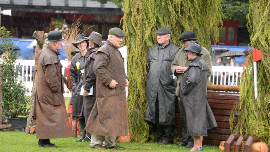 Bad weather during the final day of the Discover Ireland Dublin Horse Show, in the RDS Dublin, yesterday. Leinster and Munster were the regions worst affected. Photograph: Dara Mac Donaill / The Irish Times
