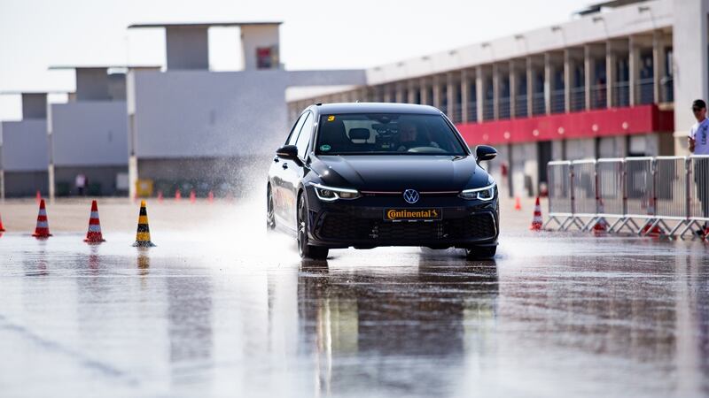 Continental had soaked a stretch of tarmac in one corner of the Portimao track, and given us a pair of VW Golf GTIs to try on it.