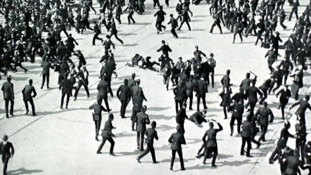 The police, armed with clubs, charging strikers during the 1913 Dublin Lockout. Photograph: Getty Images