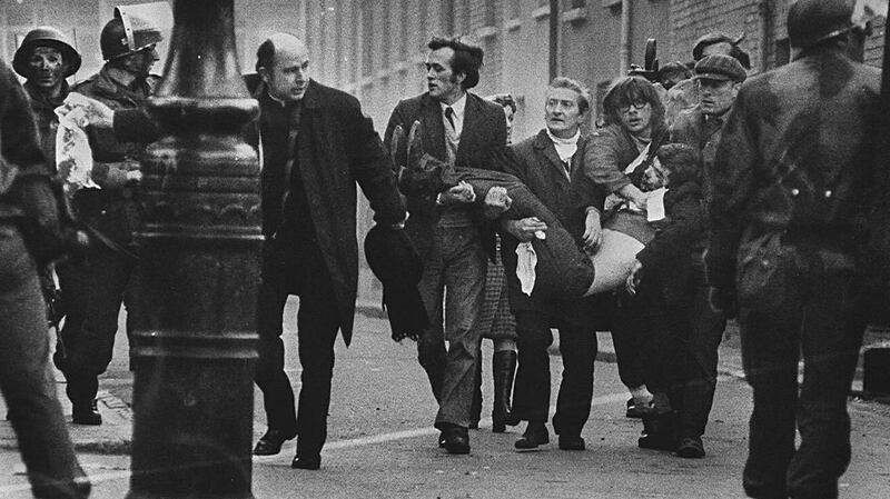 Edward Daly runs down the street with an injured man on ‘Bloody Sunday’ on January 30th 1972