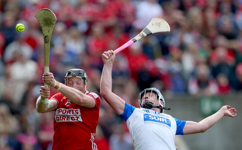Cork’s Damien Cahalane and Stephen Bennett of Waterford battle it out at Pairc Ui Chaoimh on Sunday. Photograph: James Crombie/INPHO