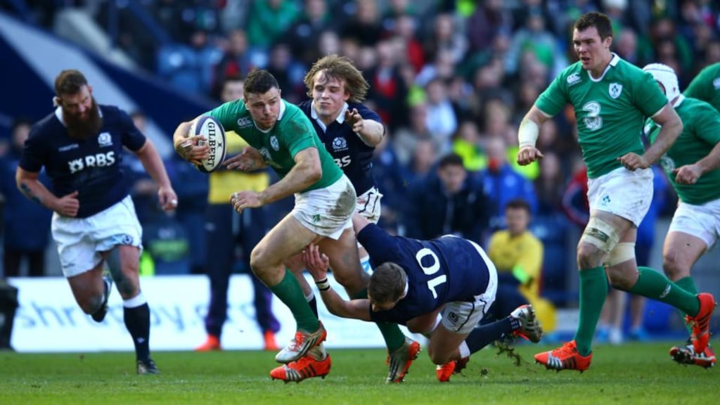 Robbie Henshaw of Ireland is tackled by Finn Russell of Scotland during the RBS Six Nations match at Murrayfield on Saturday. Photograph: Richard Heathcote/Getty Images