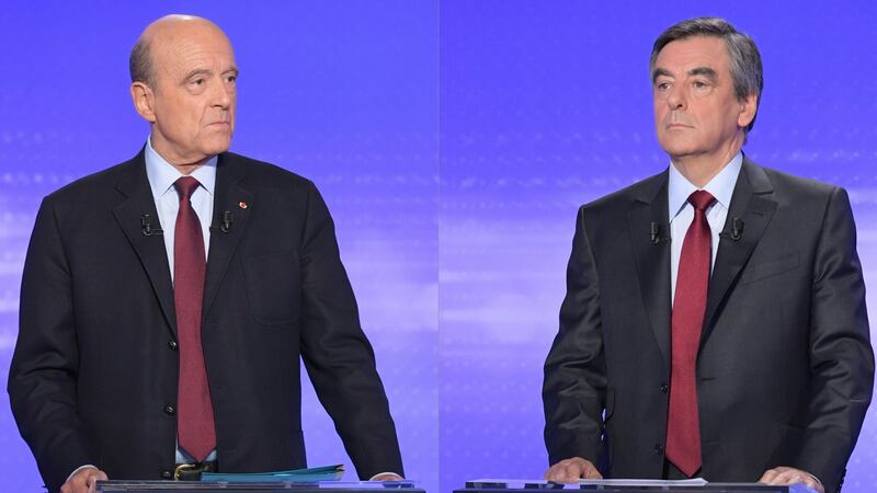 Alain Juppé and Francois Fillon are both former prime ministers. Photograph: Christophe Archambault/AFP/Getty Images