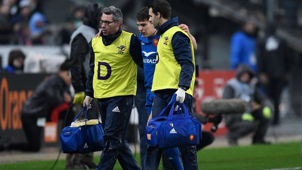 France’s Antoine Dupont is led off the field towards the end of Ireland’s narrow Six Nations win. Photograph: Christophe Simon/AFP