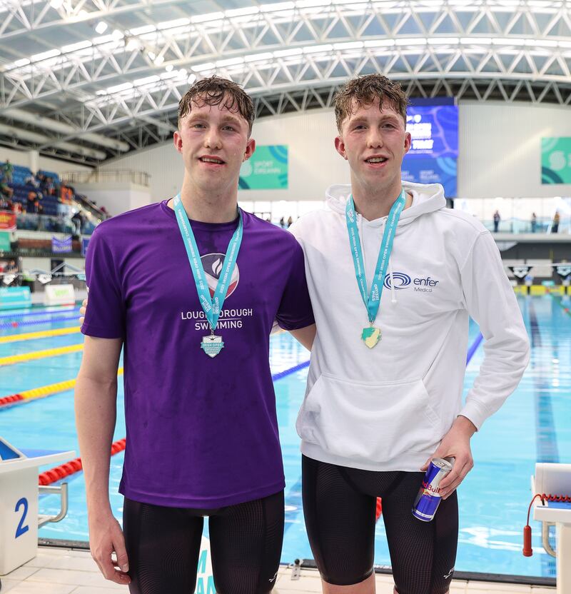 Daniel Wiffen celebrates his victory with his brother Nathan (left) who finished second. Photograph: Ryan Byrne/Inpho