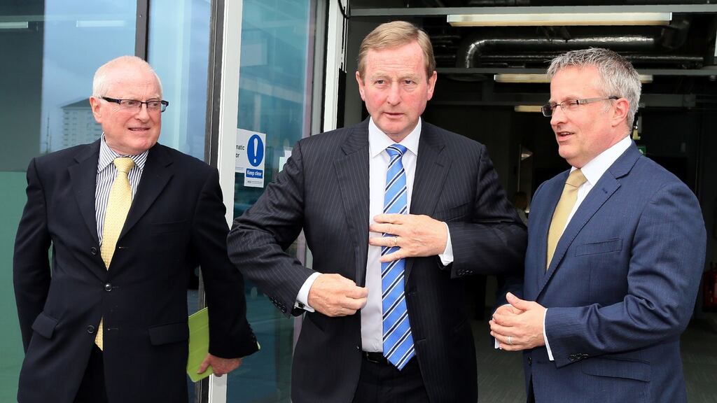 Enda Kenny at Ulster University in Belfast with Prof Alastair Adair (left), deputy vice-chancellor, and Prof Paddy Nixon, vice-chancellor, before his EU referendum speech. Photograph: Paul Faith/AFP/Getty Images