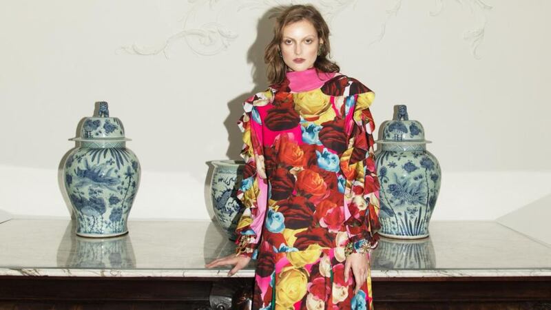 All-over-roses printed silk scarf €95, ruffle dress €190, rose print velvet leggings €75, velvet shoes €140