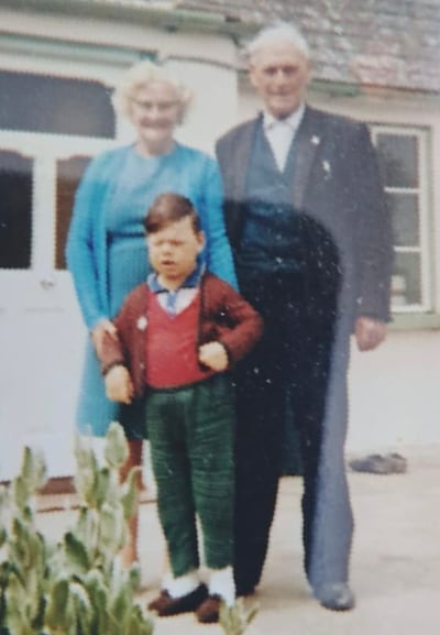 Séamus Mooney with his mother, Bridie, and father, Michael
