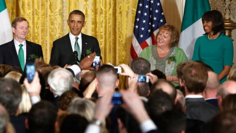 Taoiseach Enda Kenny, US president Barack Obama, Fionnuala O'Kelly and Michelle Obama share the stage during a St Patrick's Day reception at the White House in Washington on Tuesday.