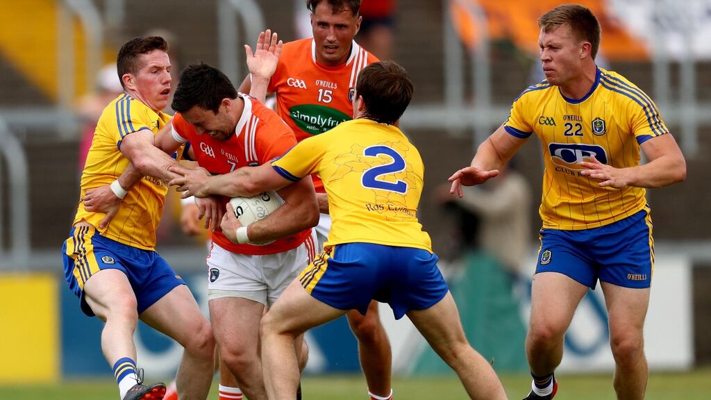 Roscommon’s Sean McDermott, David Murray and Niall Daly tackle Armagh’s Aidan Forker and Stephen Sheridan at O’Moore Park. Photograph: James Crombie/Inpho