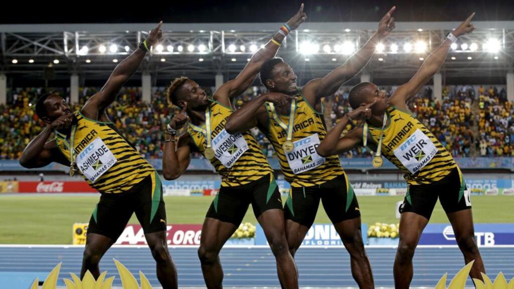 Jamaica’s 4x200 relay team strike a pose on the medal podium after winning the event at the IAAF World Relays Championships in Nassau Bahamas; Nickel Ashmeade, Jason Livermore, Rasheed Dwyer and Warren Weir. Photo: Mike Segar/Reuters