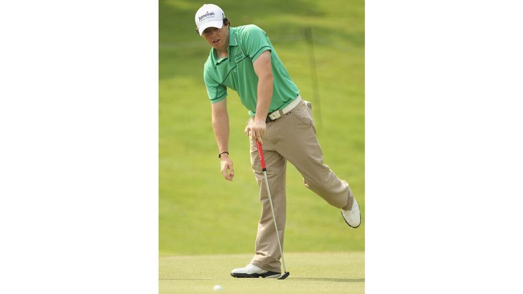 Rory McIlroy follows his putt during the second round of the Maybank Malaysian Open at Kuala Lumpur Golf & Country Club on April 15th, 2011, in Kuala Lumpur, Malaysia. - (Photograph: Ian Walton/Getty Images)