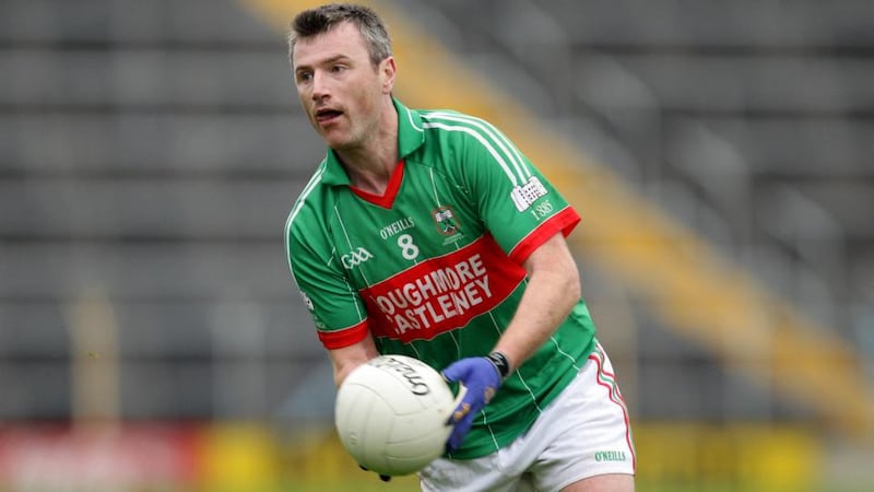 Loughmore-Castleiney are a genuine dual code team and David Kennedy is seen here in action for the club’s footballers. Photograph: Cathal Noonan/Inpho