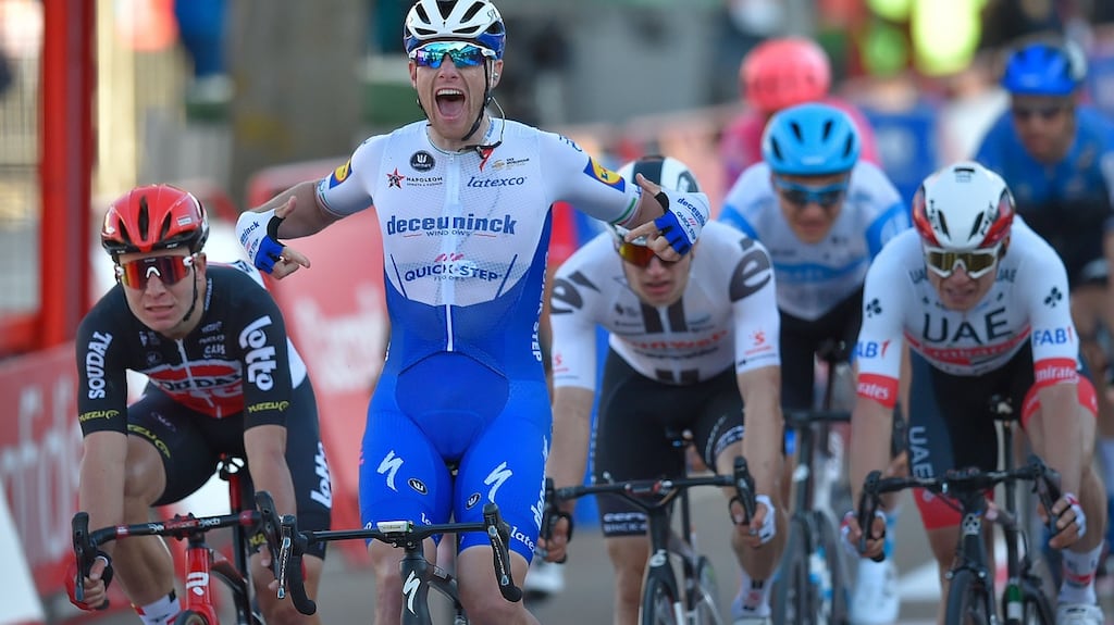 Team Deceuninck’s  Sam Bennett celebrates as he crosses the finish-line of the 9th stage of the  La Vuelta cycling tour of Spain before being subsequently relegated for “over aggressive riding”. Photograph: Ander Gillenea/AFT/Getty