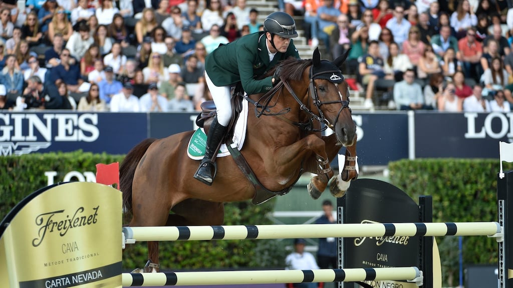 Billy Twomey won the Golden Drum of Basel Trophy following his victory with Lady Lou in Saturday night’s jump-off class. Photo: Davide Mombelli - Corbis/Corbis via Getty Images
