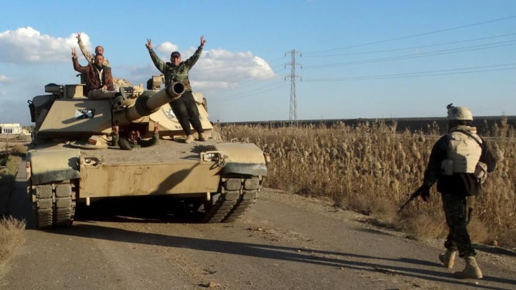 Iraqi  forces   on the eastern outskirts of Ramadi: The recapture of the area from Islamic State secures a link between the city  and  an  army base operated by US-led coalition forces. Photograph:  Stringer/Reuters