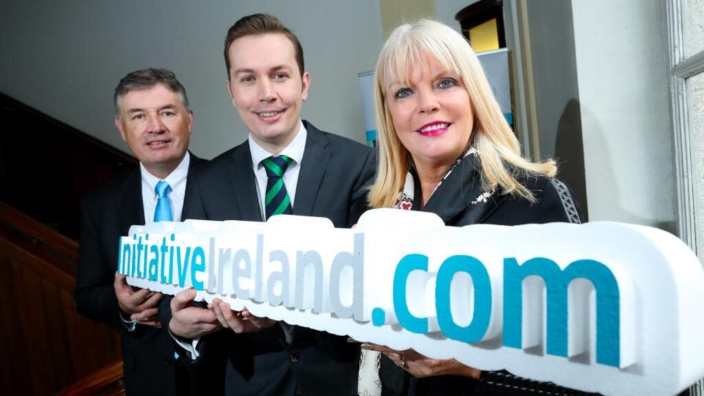 Minister of Jobs Mary Mitchell O’Connor with (left) Pádraig M Rushe and Padraig W Rushe of Initiative Ireland at the announcement on Wednesday of its planned expansion. Photograph: Maxwell