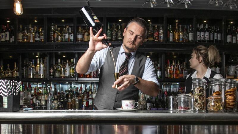 Julius Havranek making cocktail