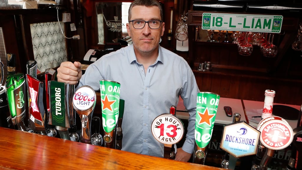 Aengus D’Arcy, owner of JJ Bowles pub in Thomondgate, Limerick, getting ready for his first customer since lockdown. Photograph: Liam Burke/Press 22