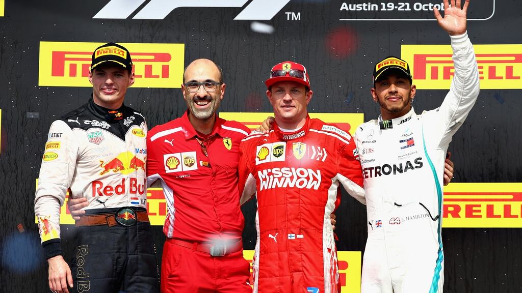 Race winner Kimi Raikkonen, second placed Max Verstappen and third placed Lewis Hamilton. Photograph: Mark Thompson/Getty Images