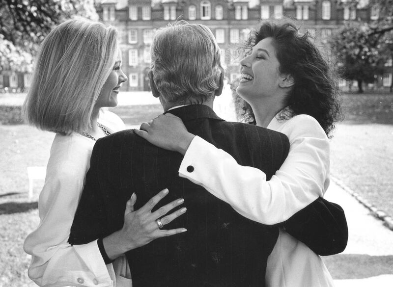 Models Laura Birmingham (left) and Sheila Eustace with Gay Byrne at a reception in Dublin to announce details of the 1991 Late Late Show fashion awards.  Photograph: Matt Kavanagh/The Irish Times