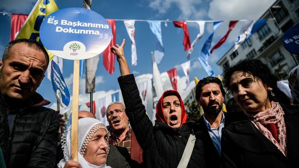 Figen Yuksekdag (right), co-leader of the pro-Kurdish Peoples’ Democracy Party (HDP), protests last weekend in Istanbul, following the arrests of the two co-mayors in Diyarbakir as part of a “terrorism” crackdown. Photograph: Ozan Kose/AFP/Getty
