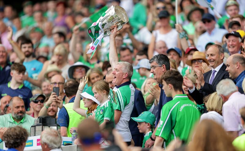 Limerick manager John Kiely lifts the Liam MacCarthy Cup at Croke Park after the win over Kilkenny in last year's final. Photograph: Laszlo Geczo/Inpho