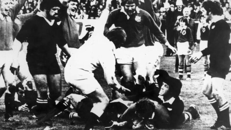 Willie Duggan scoring the Lions’ only try in a match they lost to the New Zealand All Blacks 19-7 at Dunedin, New Zealand, in August 1977. The cheering Lions are (left to right), Peter Wheeler, Fran Cotton and Derek Quinnell.