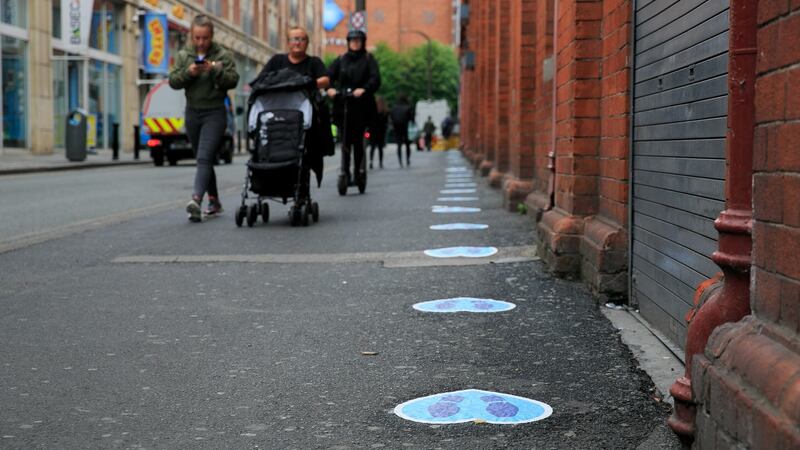 Social distancing markers on the pavement outside Penneys on Henry Street in Dublin. Photograph: Gareth Chaney/Collins