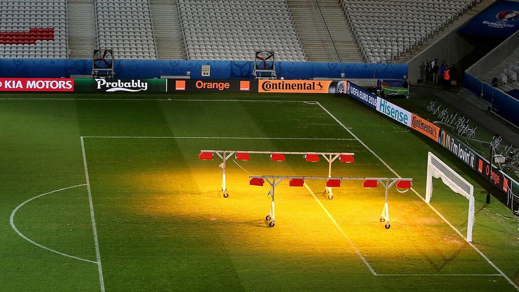 A view of Stade Pierre-Mauroy as the pitch is treated on Tuesday. Photo: Donall Farmer/Inpho