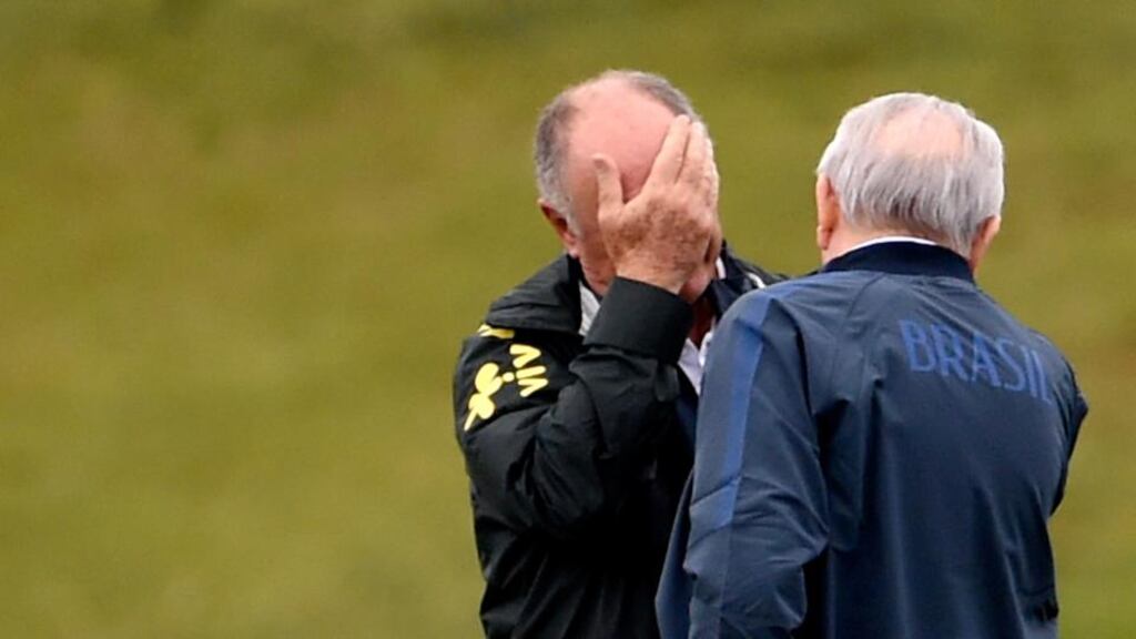 Luiz Felipe Scolari (left) gestures with Jose Maria Marin, the president of the Brazilian Football Confederation (CBF), during a training session of the Brazilian national football team at the squad’s Granja Comary training complex on Friday. Photograph: Getty Images.