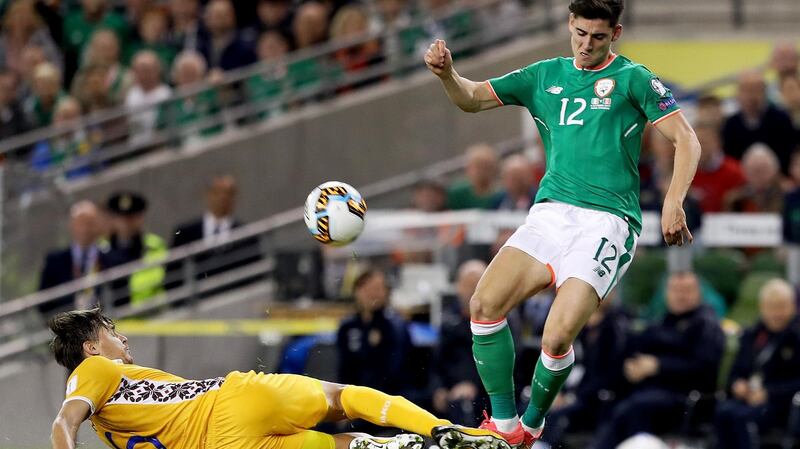 Ireland’s Callum O’Dowda is challenged by Alexandru Epureanu. Photograph: Tommy Dickson/Inpho