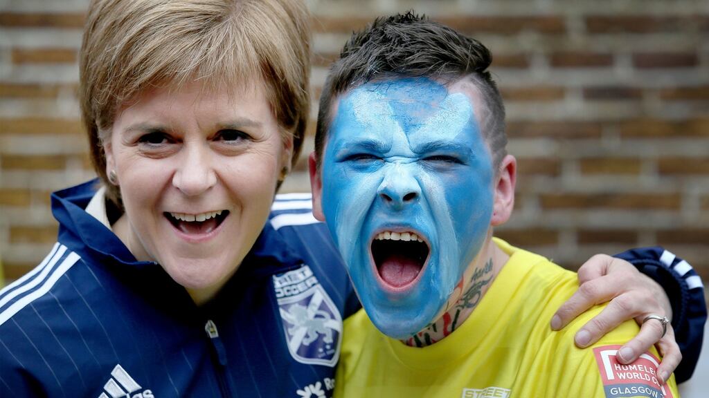 First Minister Nicola Sturgeon with Krissii Rodgers, goalkeeper for the Scotland women team, at the Homeless World Cup in George Square, Glasgow. Photograph: Jane Barlow/PA Wire.