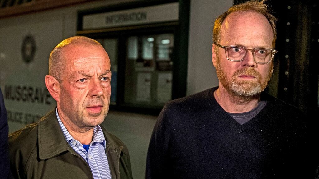 Investigative journalists Barry McCaffrey (left) and Trevor Birney (right) outside Musgrave Street police station in Belfast. Photograph: Liam McBurney/PA Wire