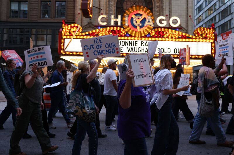 People protesting in Chicago on Monday against operations by ICE targeting undocumented immigrants who have committed crimes. Photograph: Able Uribe/EPA