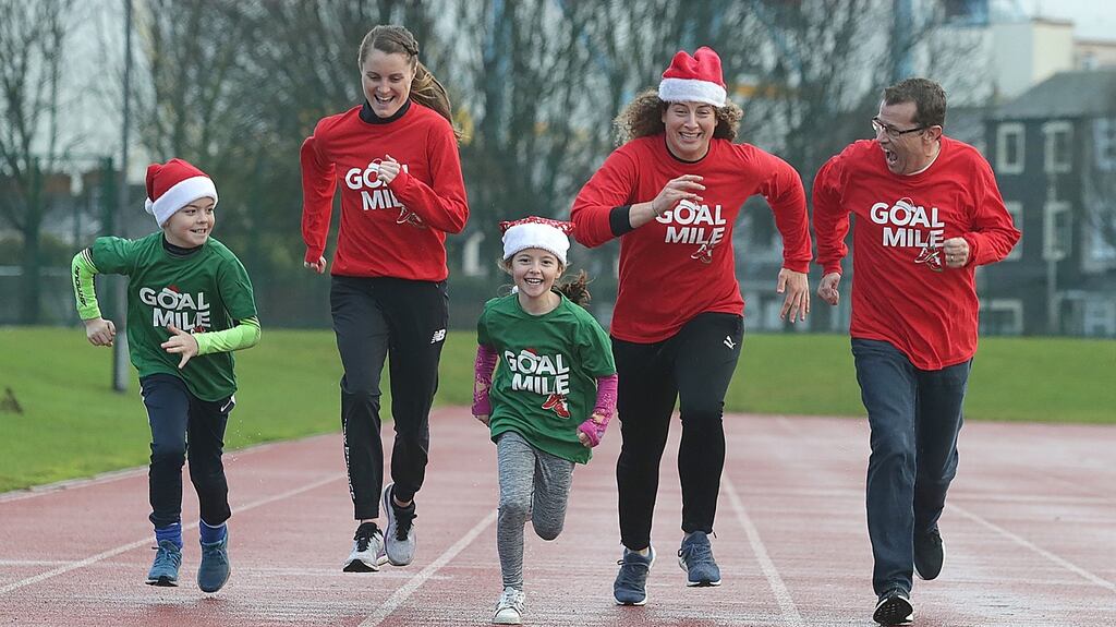From left to right are, Rossa Moore (10), from Sandymount, champion middle-distance runner Ciara Mageean, Saoirse Moore (7), Irish rugby international Jenny Murphy and Paul Howard (aka Ross O’Carroll-Kelly) at the launch of the 38th annual GOAL Mile, Ireland’s longest running fundraising event . Irishtown Stadium. Photograph: Damien Eagers
