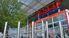 Tesco reports 51.5% fall in pre-tax profits