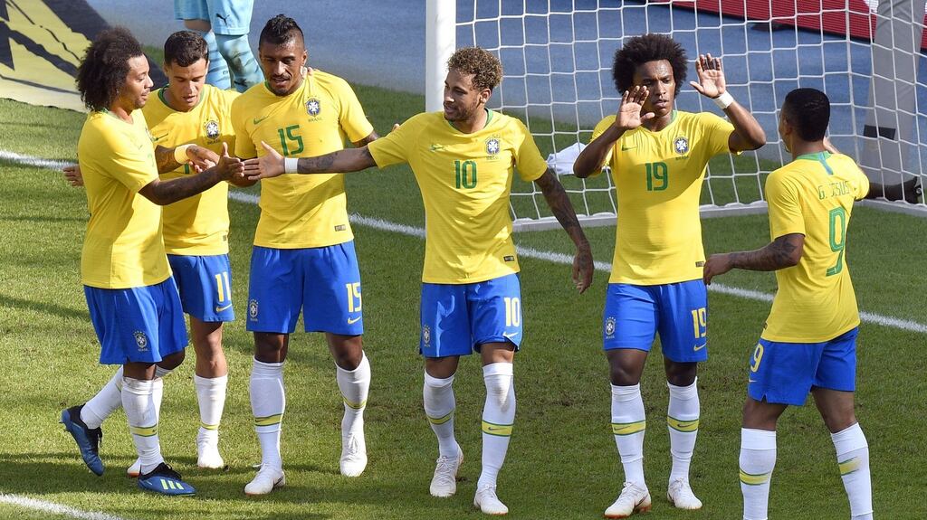 Brazil players celebrate a goal during their 3-0 victory against Austria in an international friendly on Sunday in Vienna. Photograph: Getty Images