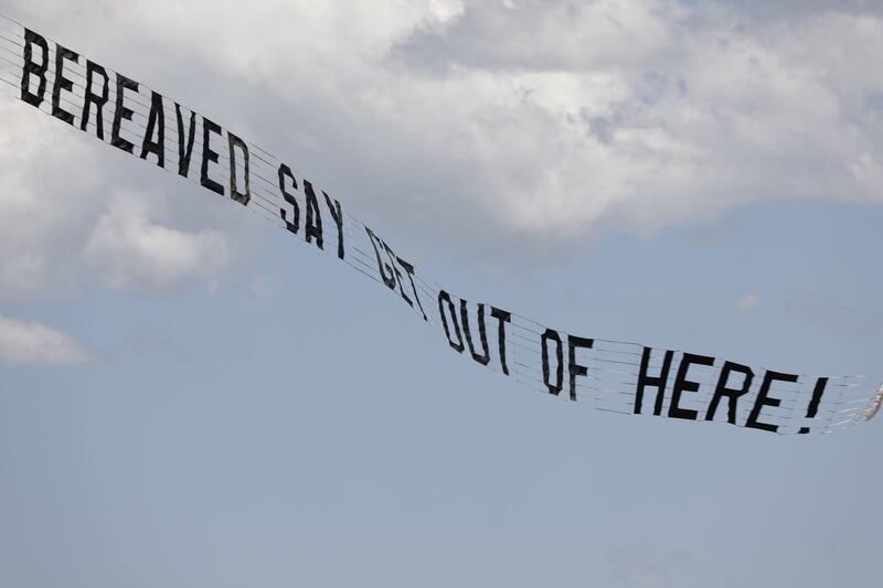 I'm a Celebrity ... Get Me Out of Here! The 'Covid bereaved say get out of here!' banner being flown over the camp in Australia. Photograph: PA