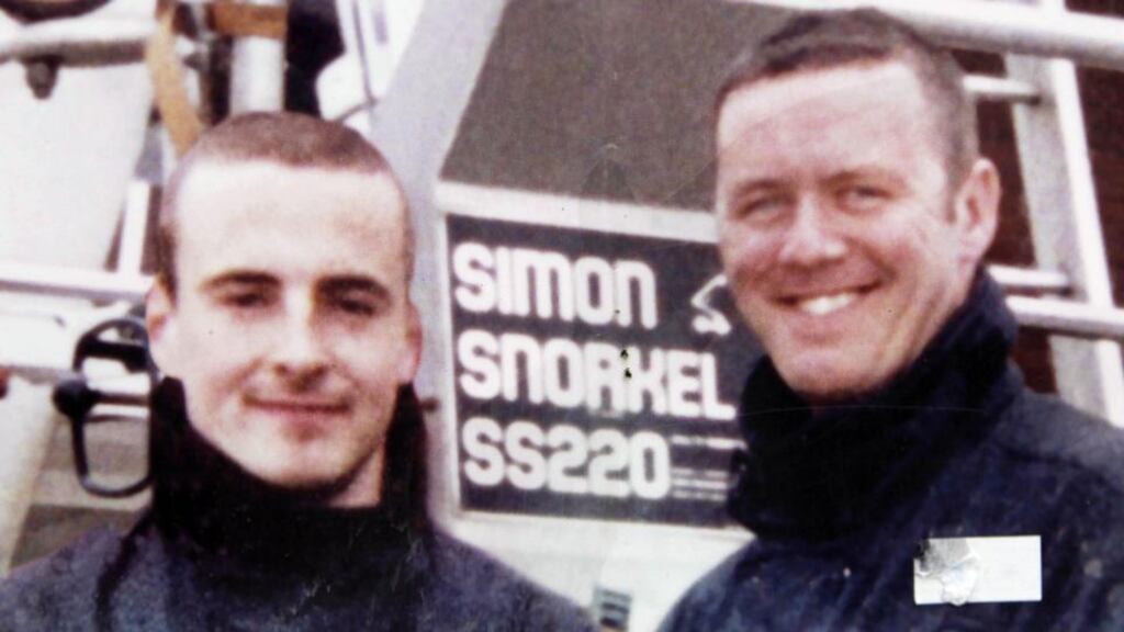 Firefighters Mark O’Shaugnessy (left) and Brian Murray at the scene where they died in a fire at a disused building in Bray, Co Wicklow, in September 2007. Photograph: Niall Carson/PA Wire