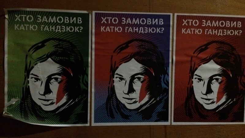 Stickers in a Kiev cafe asking “Who put out a contract on Katya Handziuk?”: she was a Ukrainian activist who died in November after terrible burns in an acid attack.