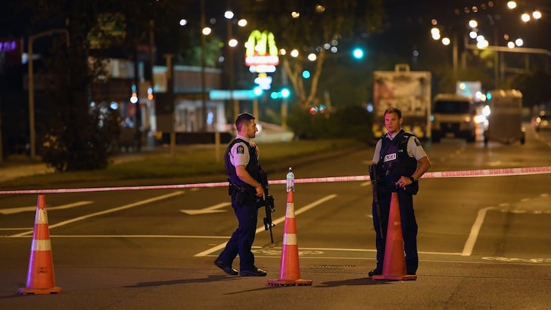 Police cordon off Linwood Avenue near the Linwood Masjid mosque. Photograph: Kai Schwoerer/Getty Images