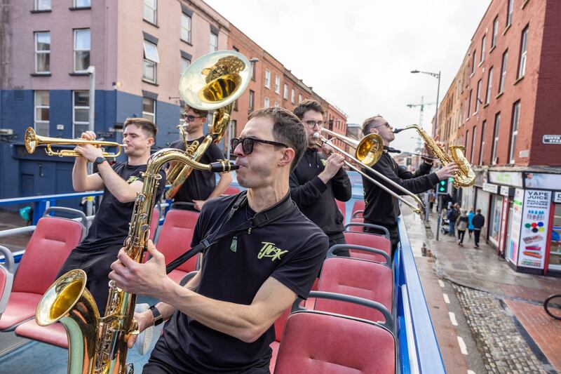 The New Brass Kings performing on the Guinness Jazz bus during the Guinness Cork Jazz Festival. Photograph: Naoise Culhane.