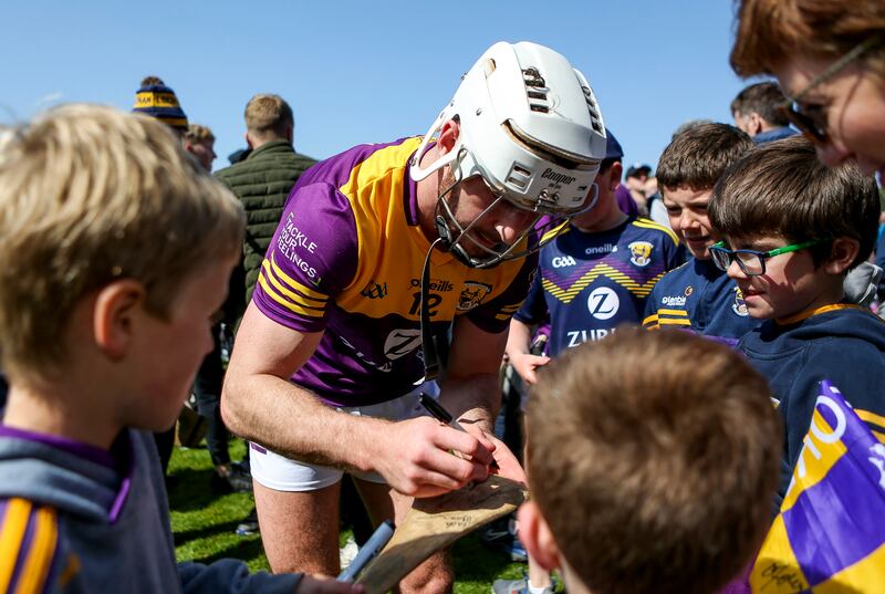 Wexford’s Oisín Foley signs autographs for supporters after the Wexford vs Kilkenny game at Chadwick's Wexford Park on Sunday. Photograph: Ken Sutton/Inpho