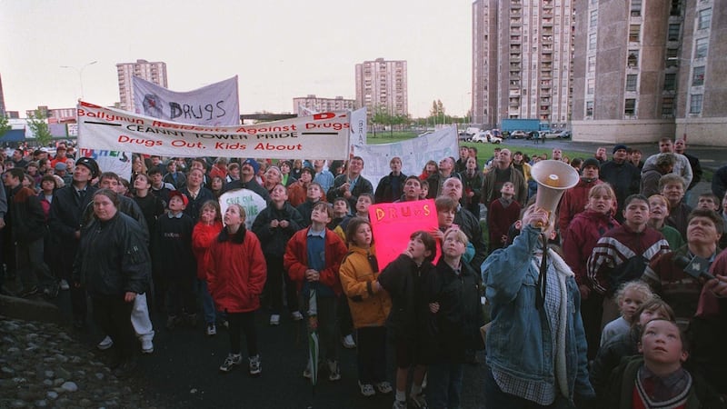 NEWS...... PEOPLE TAKING PART IN A ANTI-DRUGS RALLY, ORGANISED BY BALLYMUN RESIDENTS AGAINST DRUGS, CHANT SLOGANS IN A VERBAL EXCHANGE WITH A RESIDENT OF ONE OF THE TOWER BLOCKS, IN BALLYMUN LAST NIGHT. PHOTOGRAPH: ERIC LUKE.