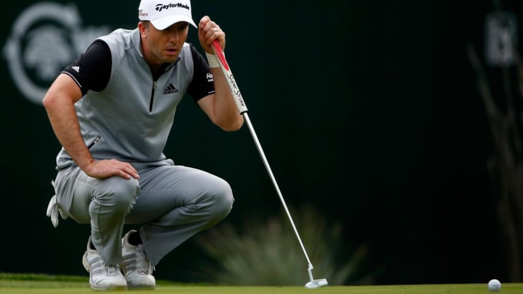Martin Laird of Scotland lines up a putt on the 16th green during the third round of the Waste Management Phoenix Open at TPC Scottsdale in Arizona. Photograph: Sam Greenwood/Getty Images